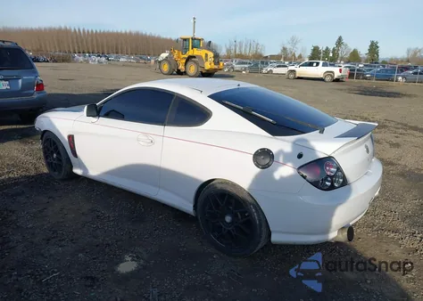 2003 Hyundai Tiburon from USA, damaged, VIN KMHHM65DX3U095780